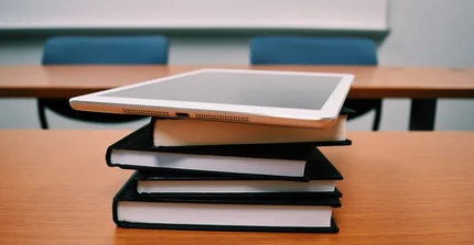 tablet and books