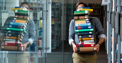 Young librarian at work